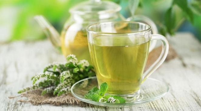Wat is het geheim tussen groene thee en afvallen?
